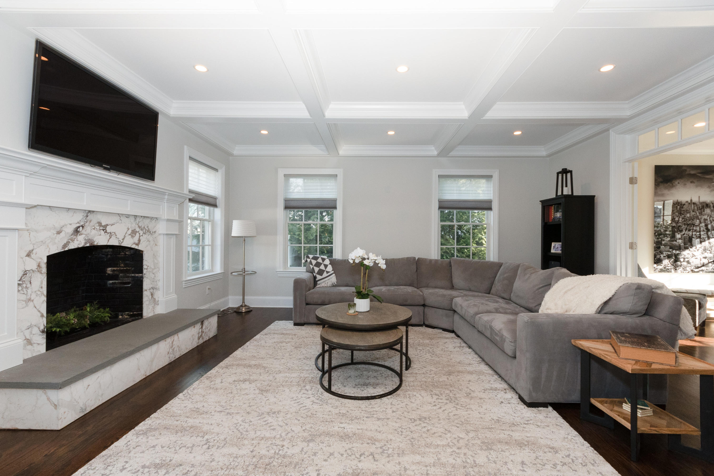 4 Echo Drive Darien, CT 06820 - Photo 19 of 40 a living room with furniture a fireplace and a flat screen tv