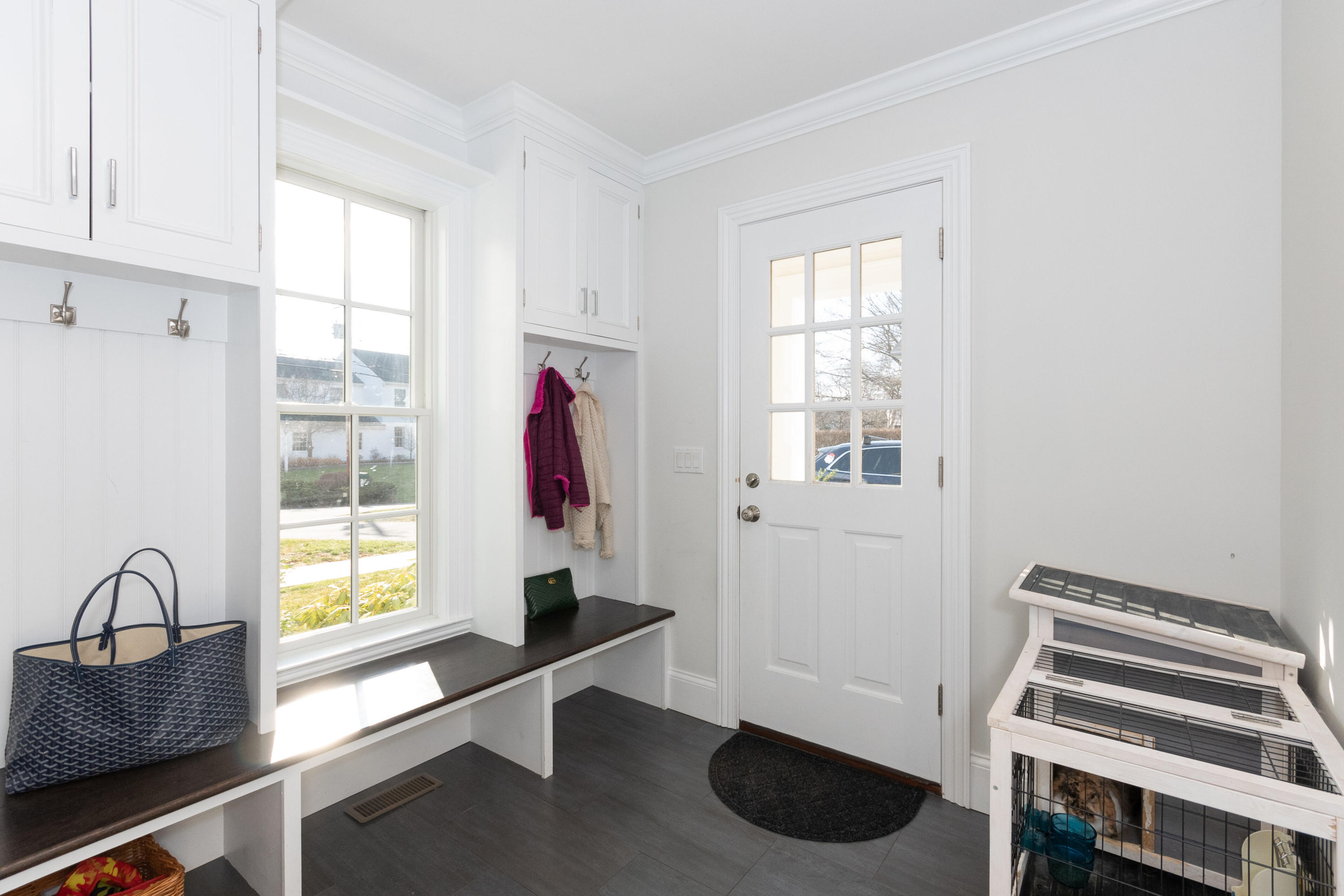 4 Echo Drive Darien, CT 06820 - Photo 21 of 40 a room with a chair and a window