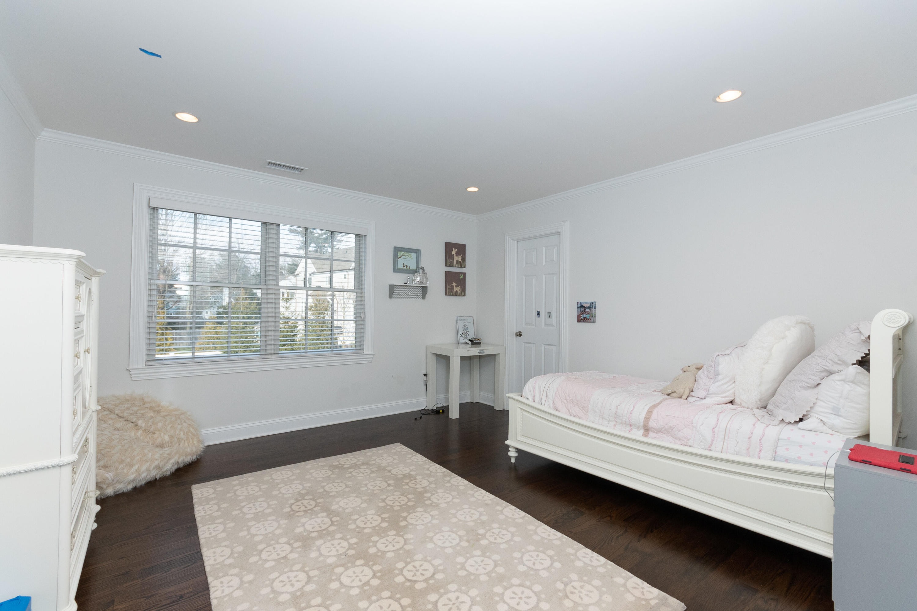 4 Echo Drive Darien, CT 06820 - Photo 31 of 40 a bedroom with a bed and a window