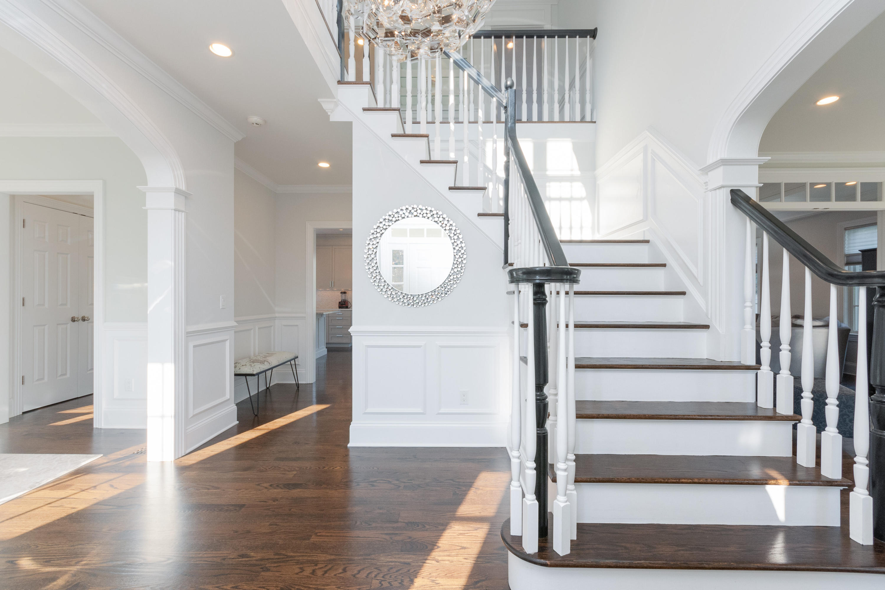 4 Echo Drive Darien, CT 06820 - Photo 6 of 40 a view of entryway and hall with wooden floor