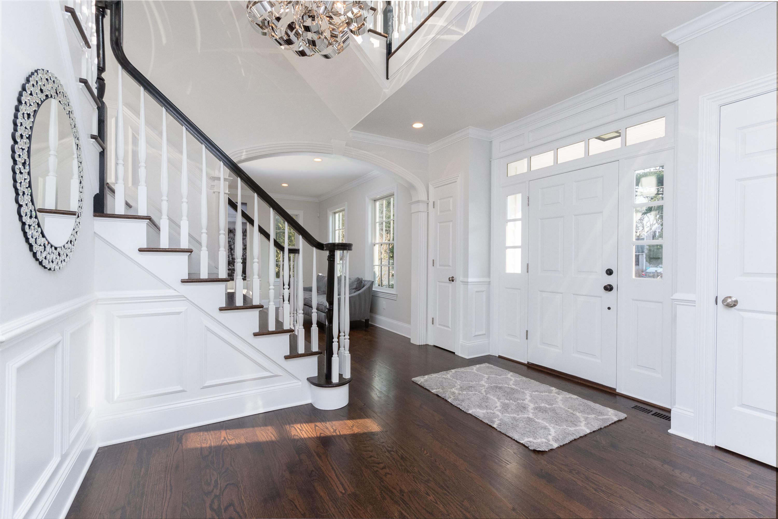 4 Echo Drive Darien, CT 06820 - Photo 7 of 40 a view of entryway and hall with wooden floor
