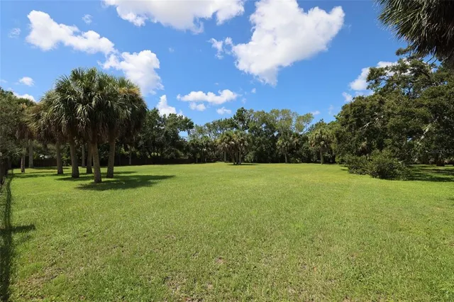 a view of swimming pool with a garden