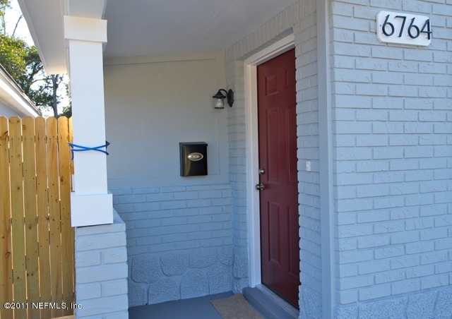 6764 Banbury Road Jacksonville, FL 32211 - Photo 3 of 17 a view of door