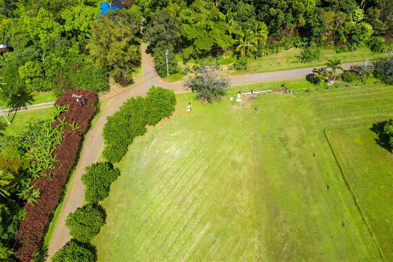 257 Door Of Faith Road Haiku, HI 96708 - Photo 4 of 14 a view of a lake with a yard