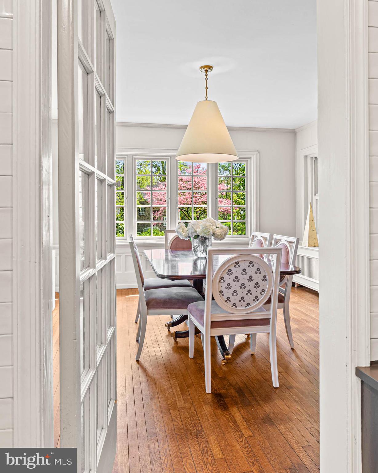 119 Cambria Court Wayne, PA 19087 - Photo 12 of 52 a view of a a dining room with furniture window and wooden floor