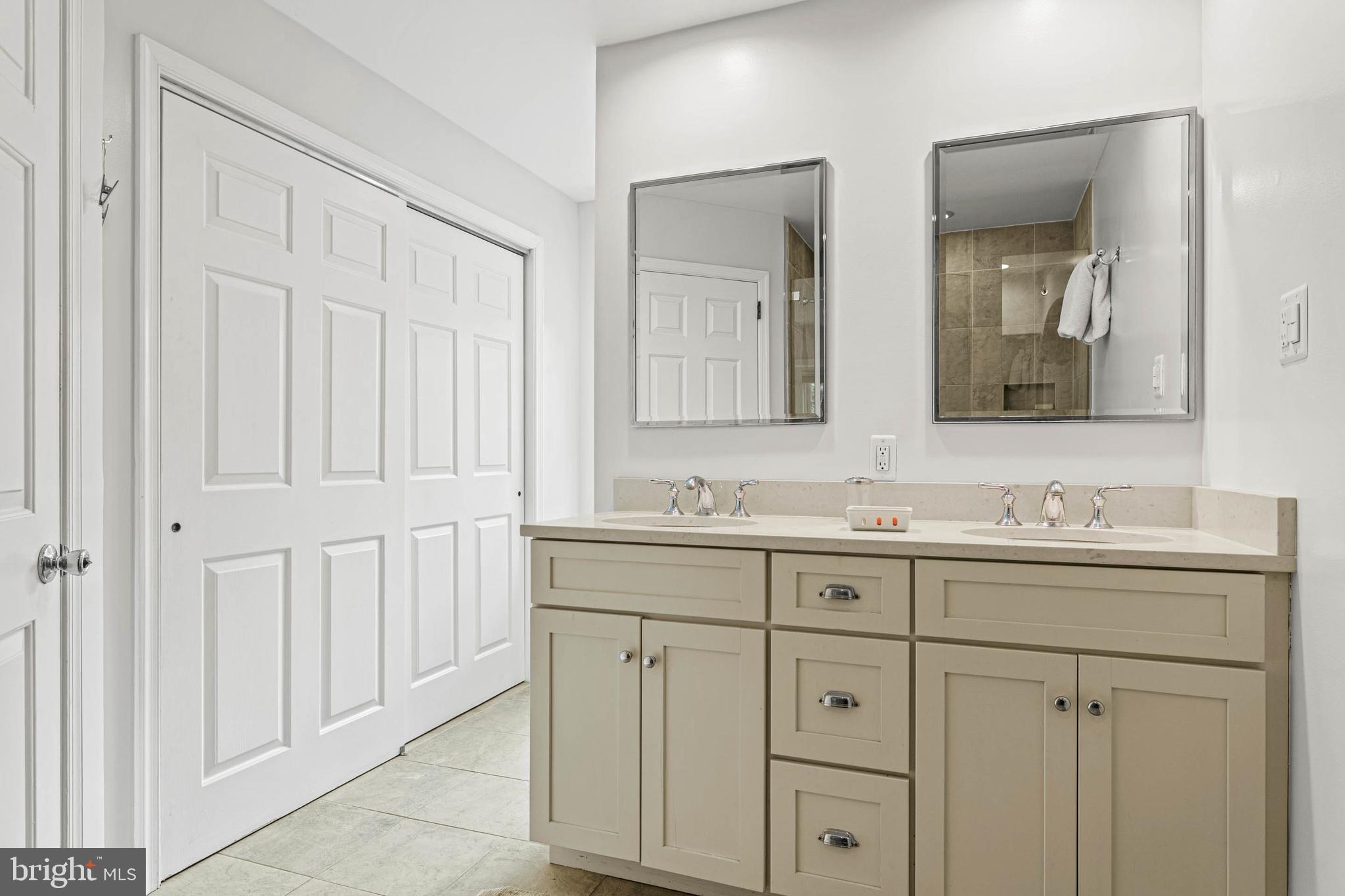 119 Cambria Court Wayne, PA 19087 - Photo 28 of 52 a bathroom with a sink and a mirror