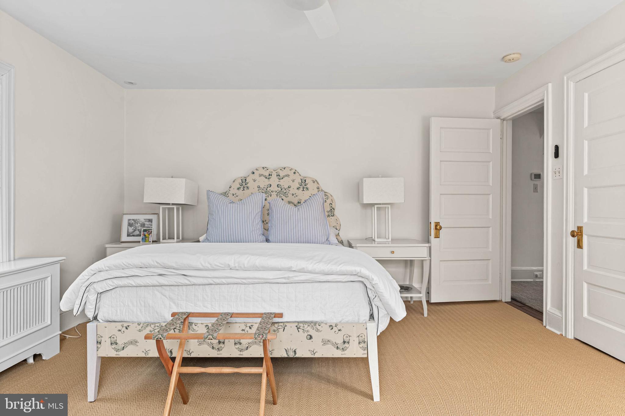 119 Cambria Court Wayne, PA 19087 - Photo 31 of 52 a bedroom with a bed and a table