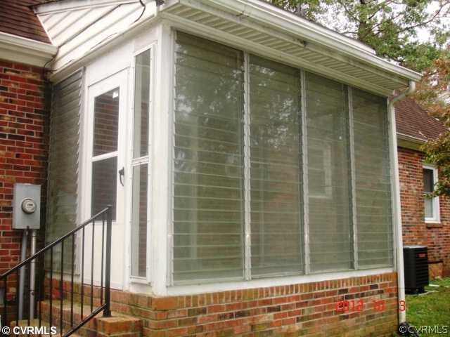 244 Lancaster Road King William, VA 23086 - Photo 10 of 13 Porch - Jalousie Porch on rear of home