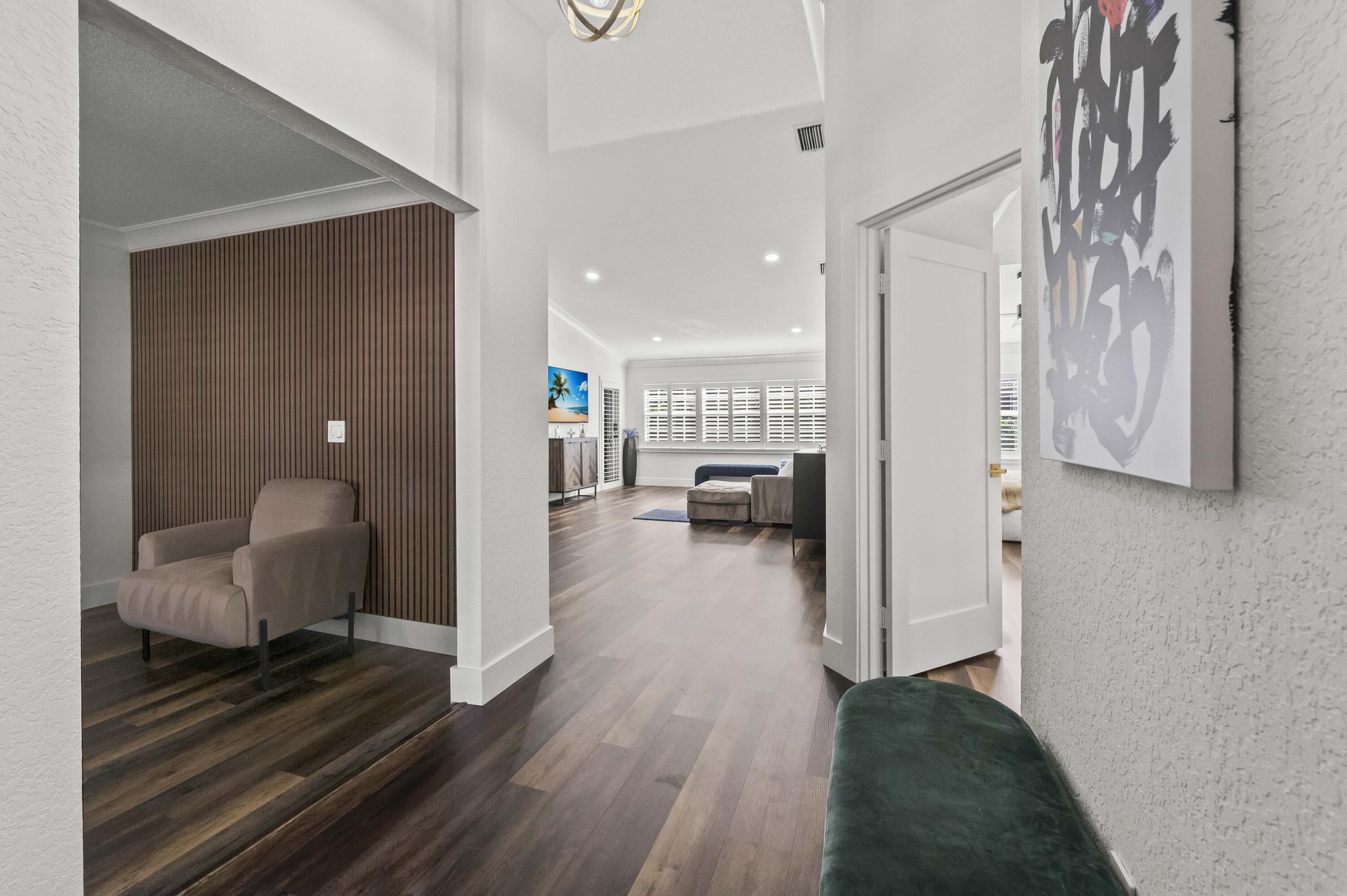 17257 Boca Club Boulevard, Unit 4 Boca Raton, FL 33487 - Photo 15 of 35 a en suite bathroom with a sink and a mirror