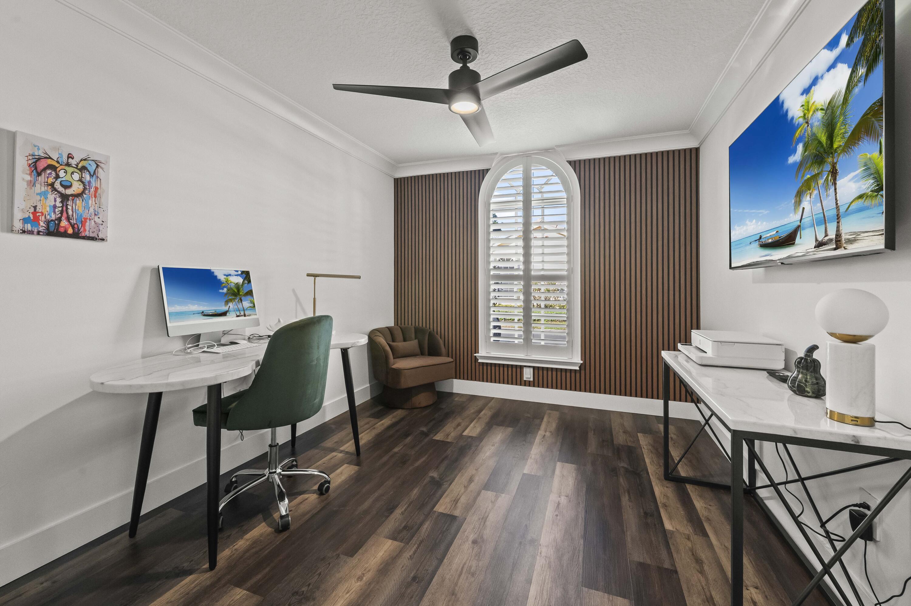 17257 Boca Club Boulevard, Unit 4 Boca Raton, FL 33487 - Photo 24 of 35 a workspace with furniture window and wooden floor