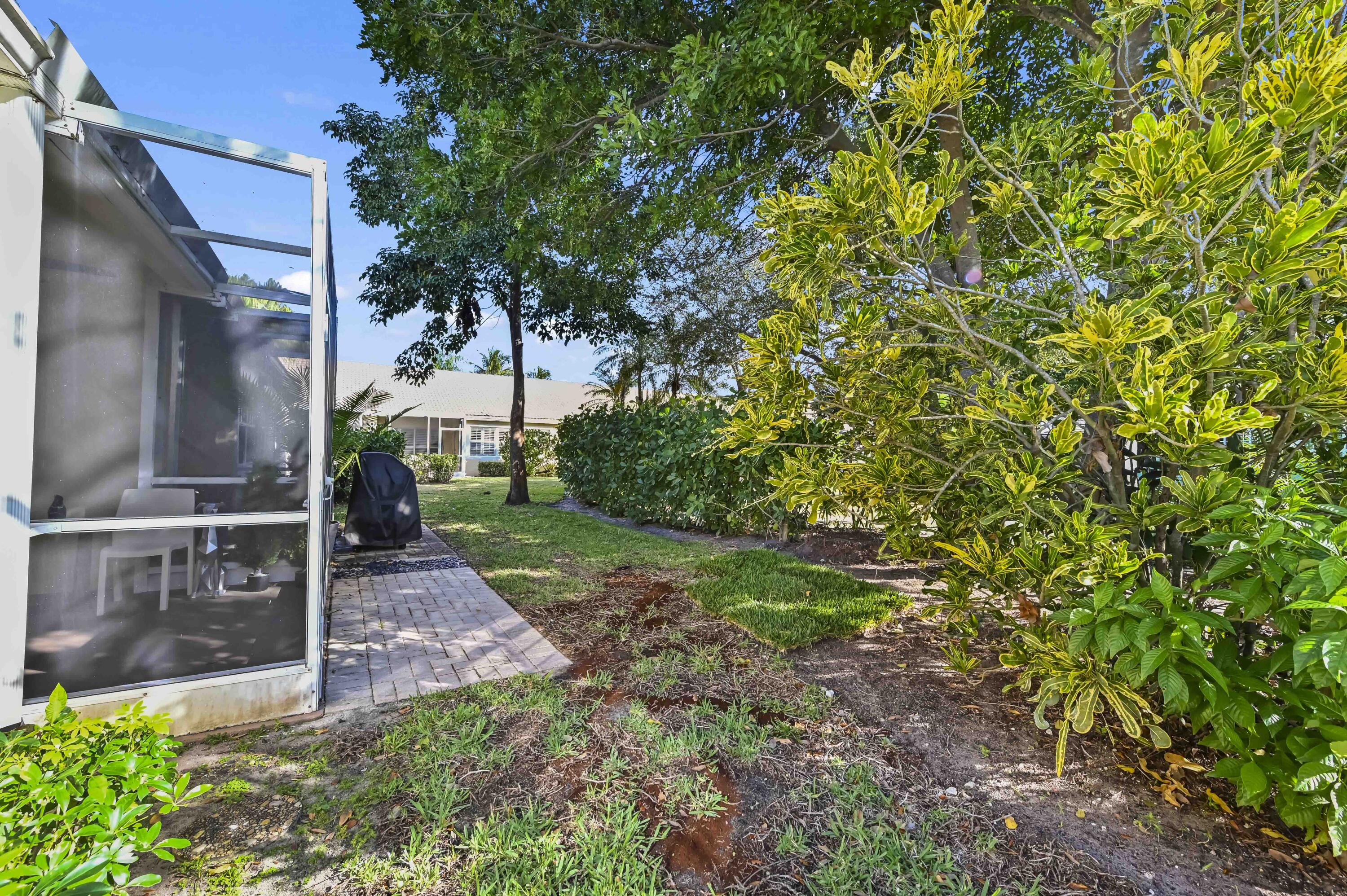 17257 Boca Club Boulevard, Unit 4 Boca Raton, FL 33487 - Photo 32 of 35 a view of a back yard
