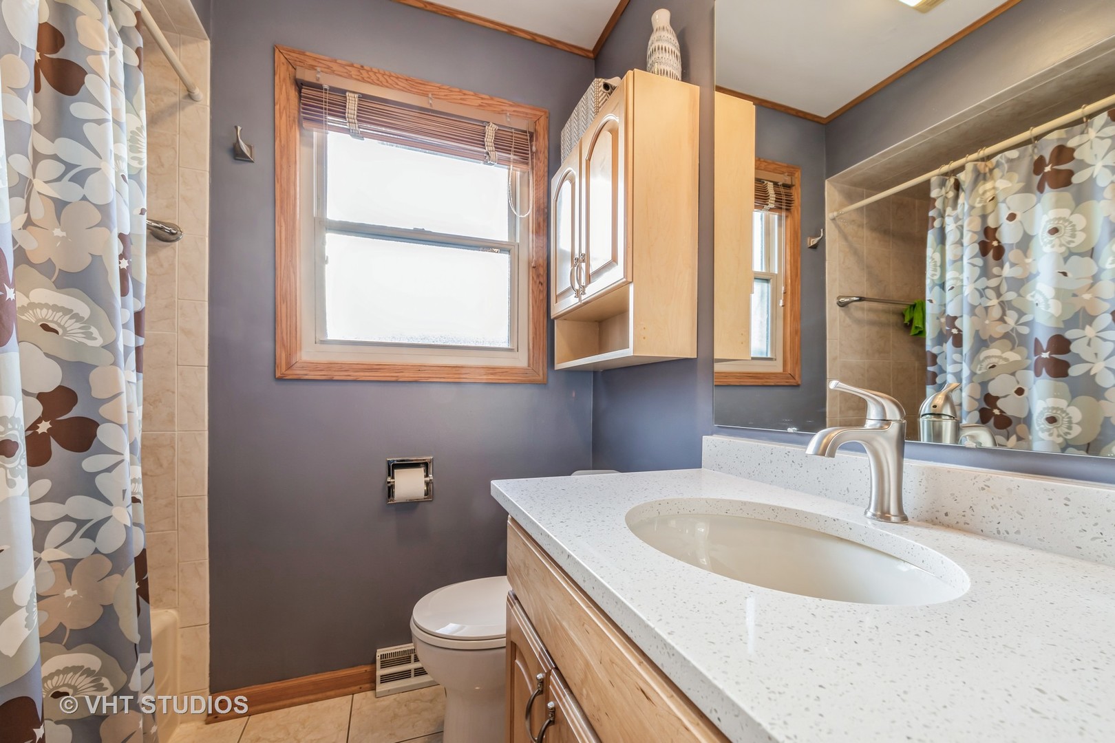 1423 Burr Oak Road Homewood, IL 60430 - Photo 8 of 12 a bathroom with a sink a toilet and a mirror