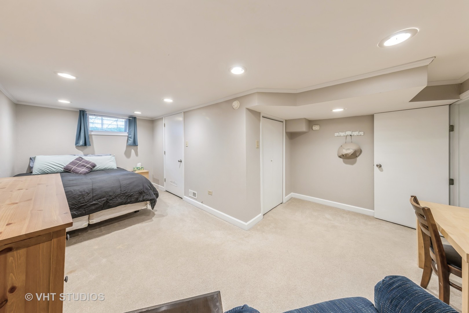 1423 Burr Oak Road Homewood, IL 60430 - Photo 9 of 12 a spacious bedroom with a bed and a couch
