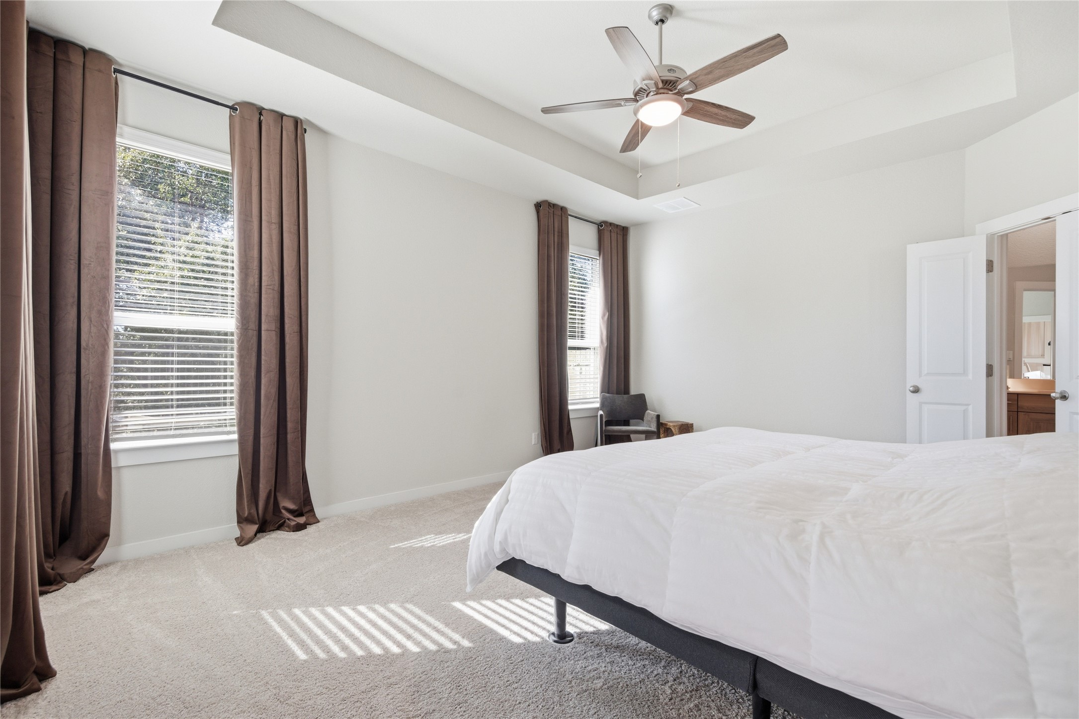 1008 Summer Glen Georgetown, TX 78628 - Photo 17 of 34 a bedroom with a bed and a large window