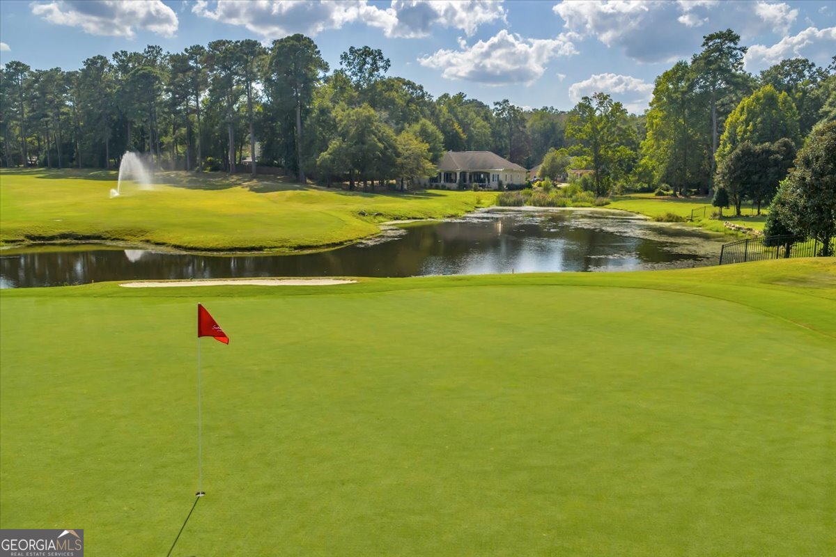 215 Falcon Crest Warner Robins, GA 31088 - Photo 13 of 18 a view of an outdoor space and swimming pool