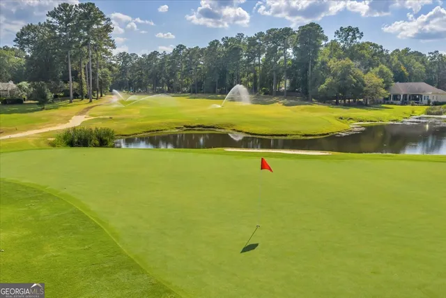 a view of a swimming pool with an ocean view
