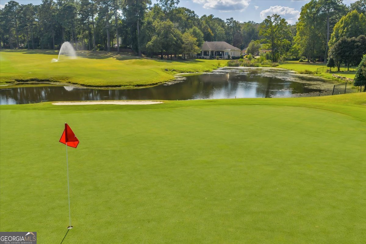 215 Falcon Crest Warner Robins, GA 31088 - Photo 15 of 18 a view of a swimming pool with an ocean view