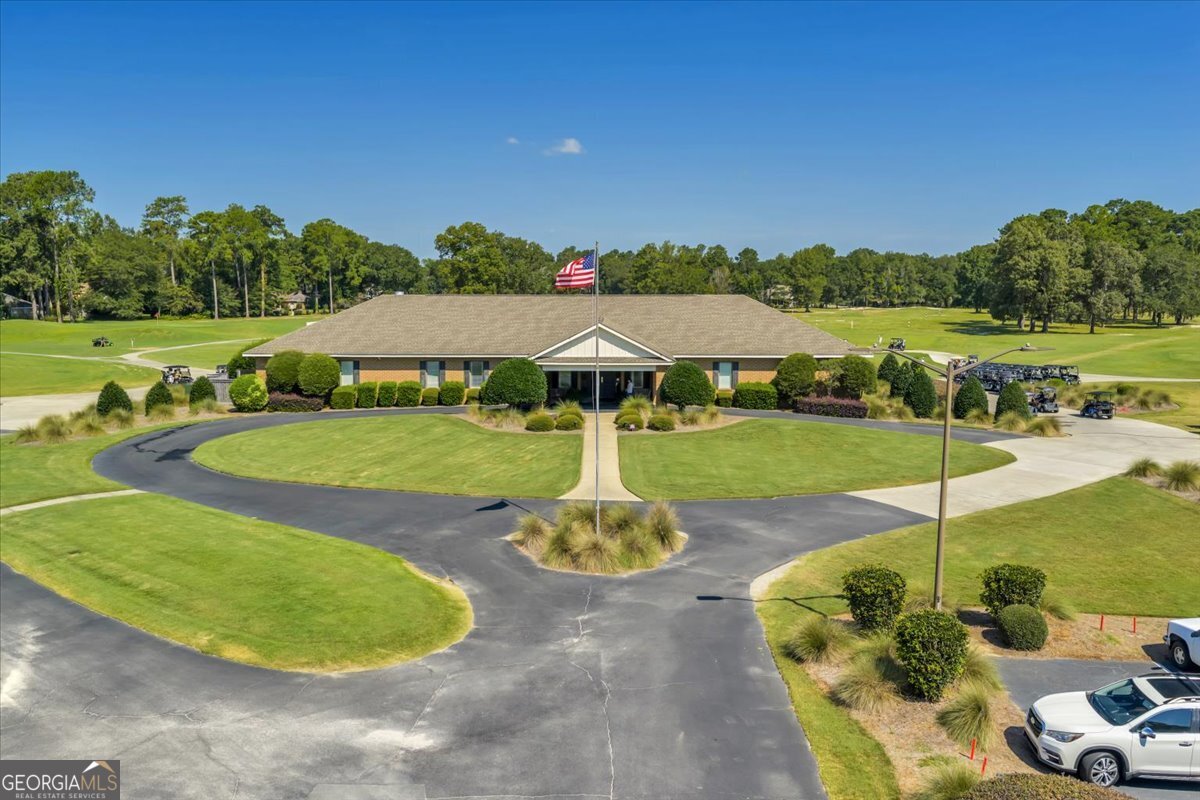215 Falcon Crest Warner Robins, GA 31088 - Photo 17 of 18 a swimming pool with outdoor seating and yard