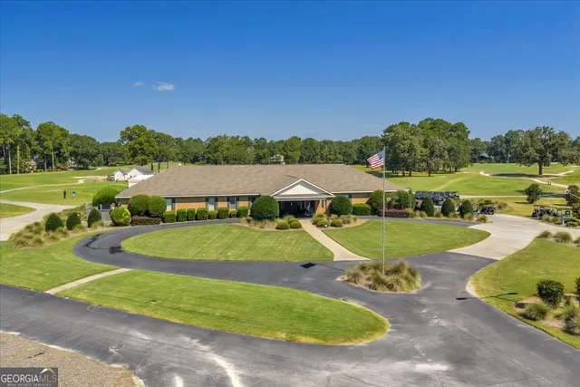 a view of swimming pool with outdoor seating