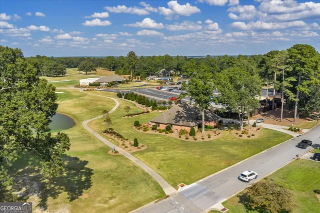 a view of a house with swimming pool