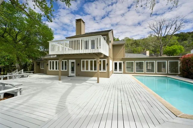 a view of balcony with wooden floor and outdoor space