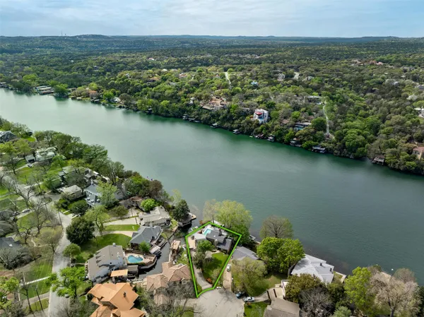 a view of a lake with a city