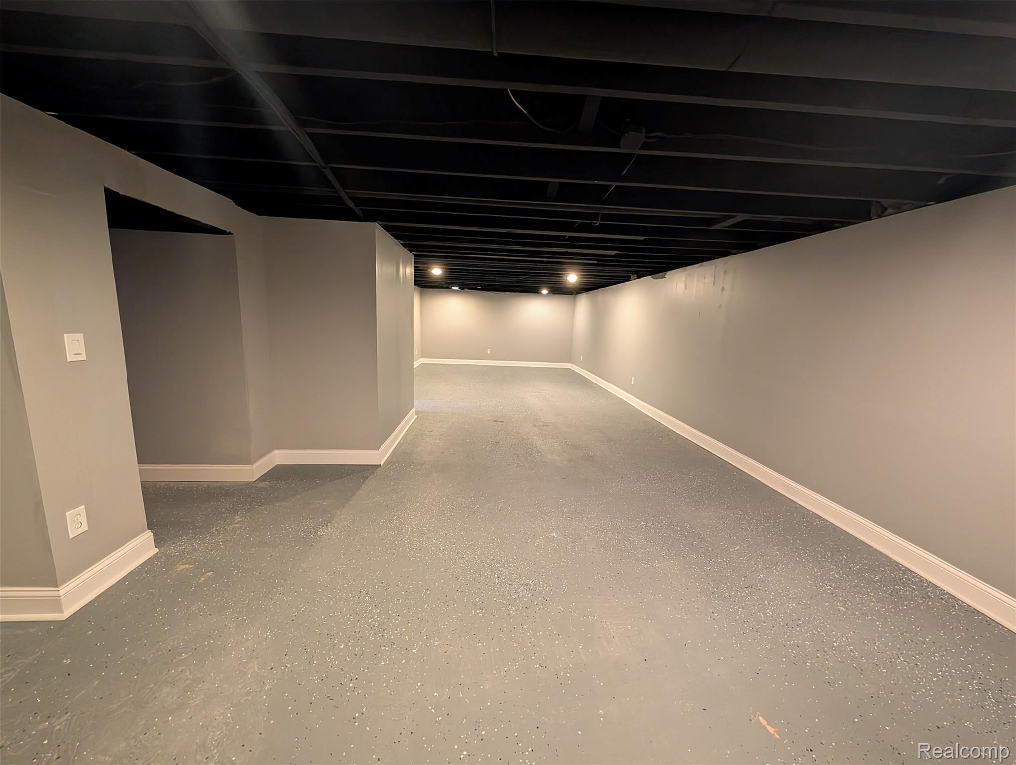 6353 Perry Road Grand Blanc, MI 48439 - Photo 25 of 34 Basement finished area.