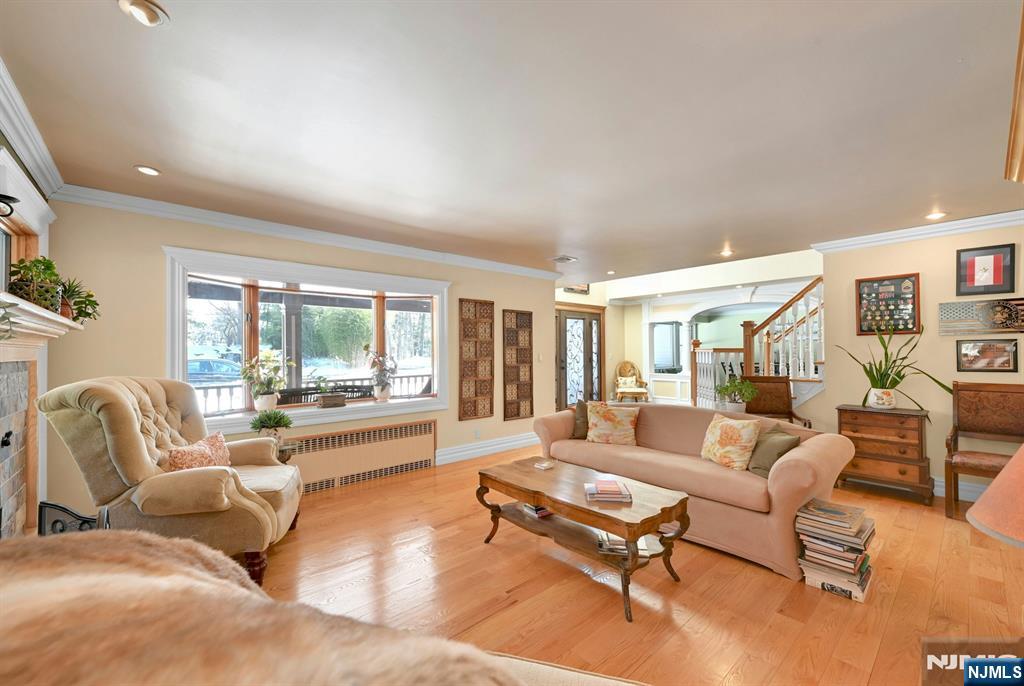 285 Chestnut Ridge Road Woodcliff Lake, NJ 07677 - Photo 18 of 46 a living room with furniture and a large window