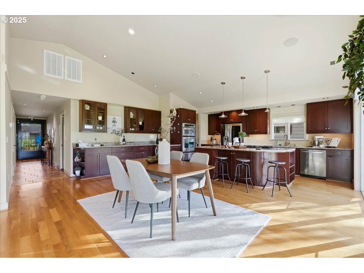 2365 Umpqua Road Woodburn, OR 97071 - Photo 16 of 33 a living room with stainless steel appliances furniture and a kitchen view