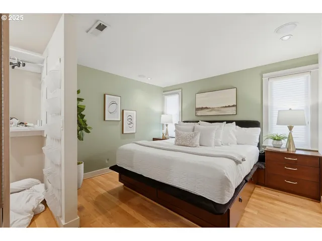 a bedroom with a bed and a view of bathroom