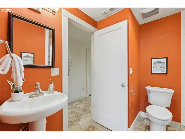 a bathroom with a sink and a toilet