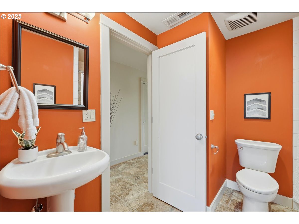2365 Umpqua Road Woodburn, OR 97071 - Photo 24 of 33 a bathroom with a sink and a toilet