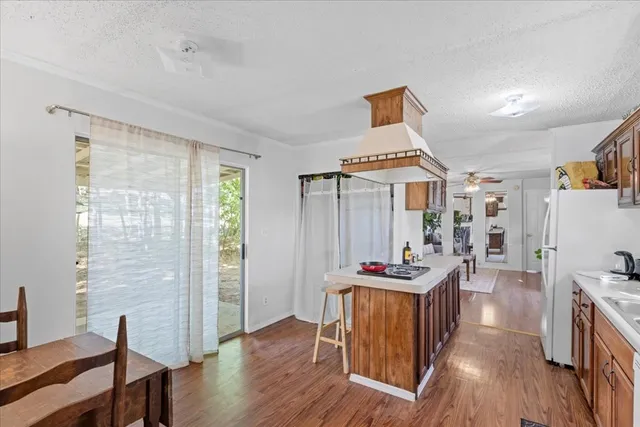 a workspace with furniture and wooden floor