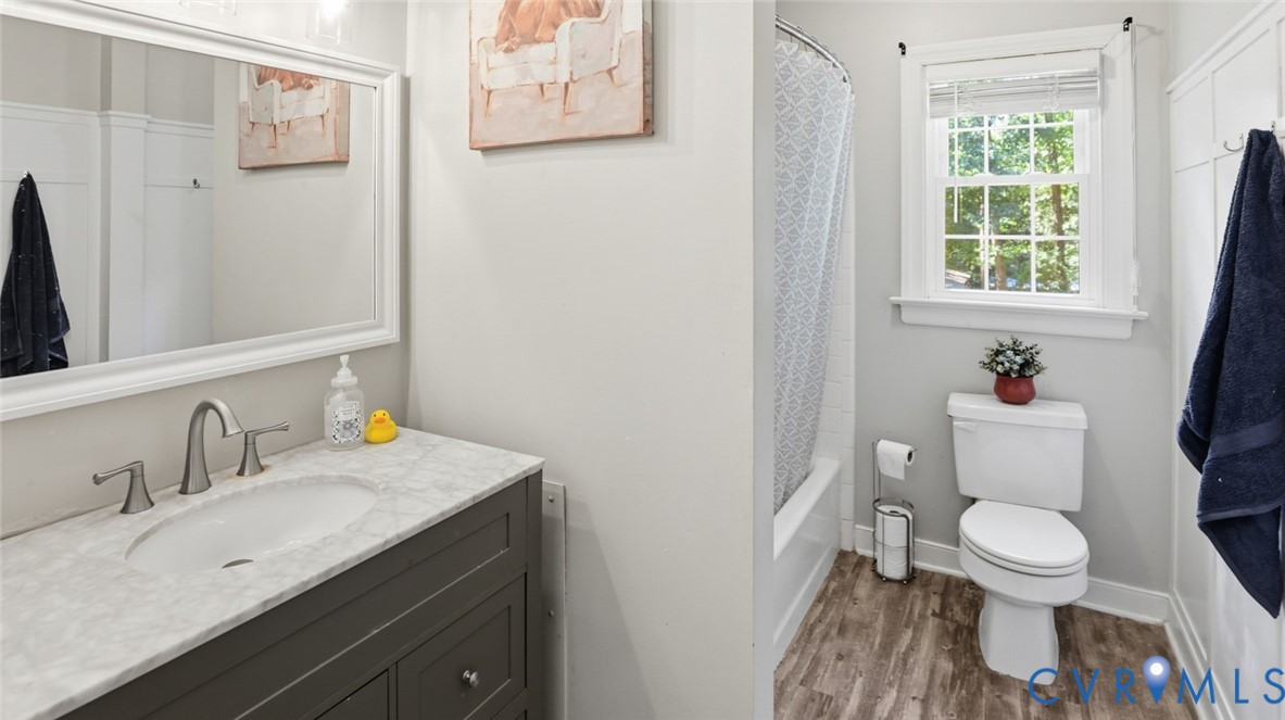 10716 Chalkley Road Richmond, VA 23237 - Photo 33 of 46 a bathroom with a sink toilet and vanity