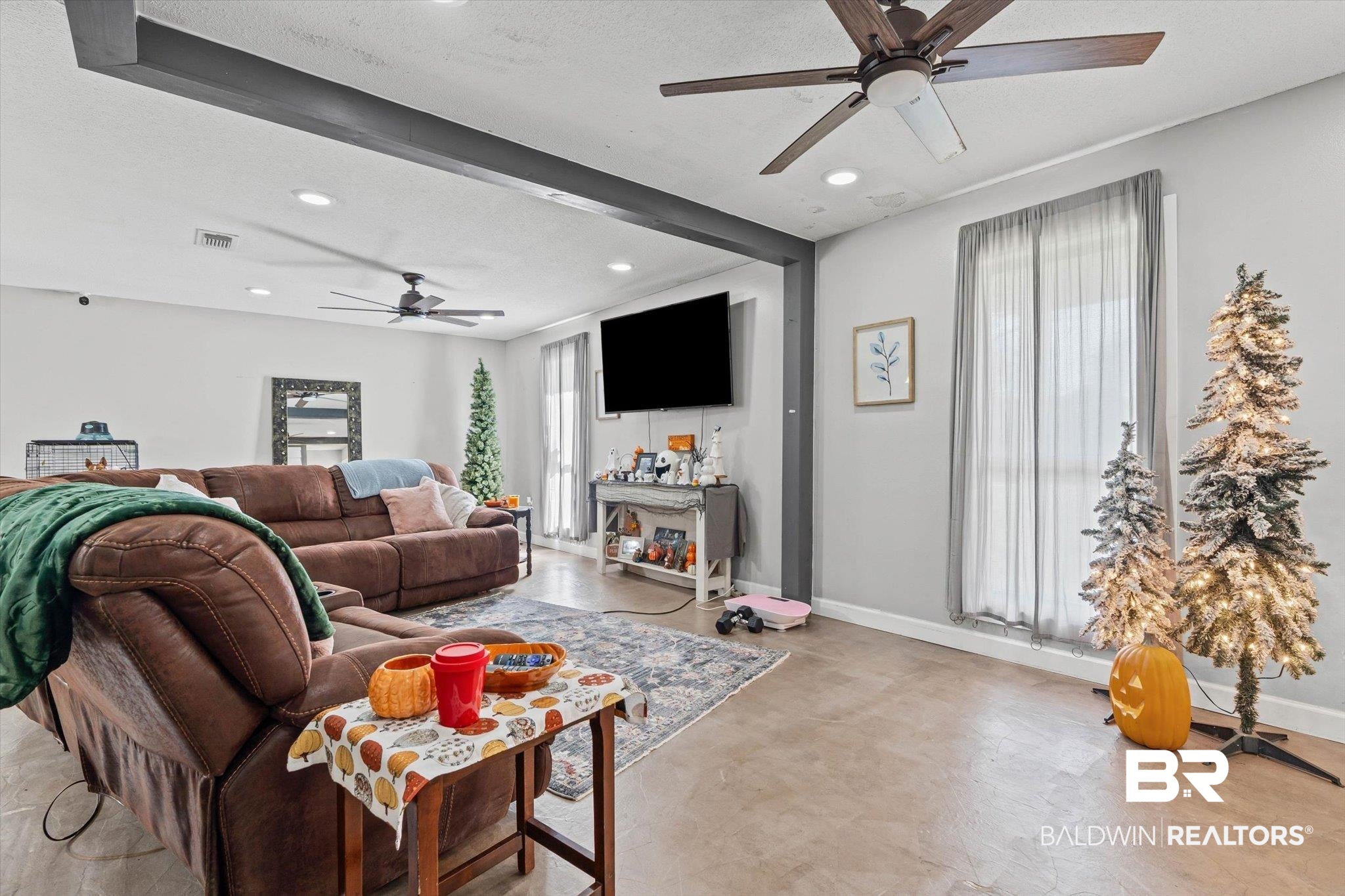 11440 Diffee Road Grand Bay, AL 36541 - Photo 6 of 22 Living room with a ceiling fan, beamed ceiling, concrete floors, and recessed lighting