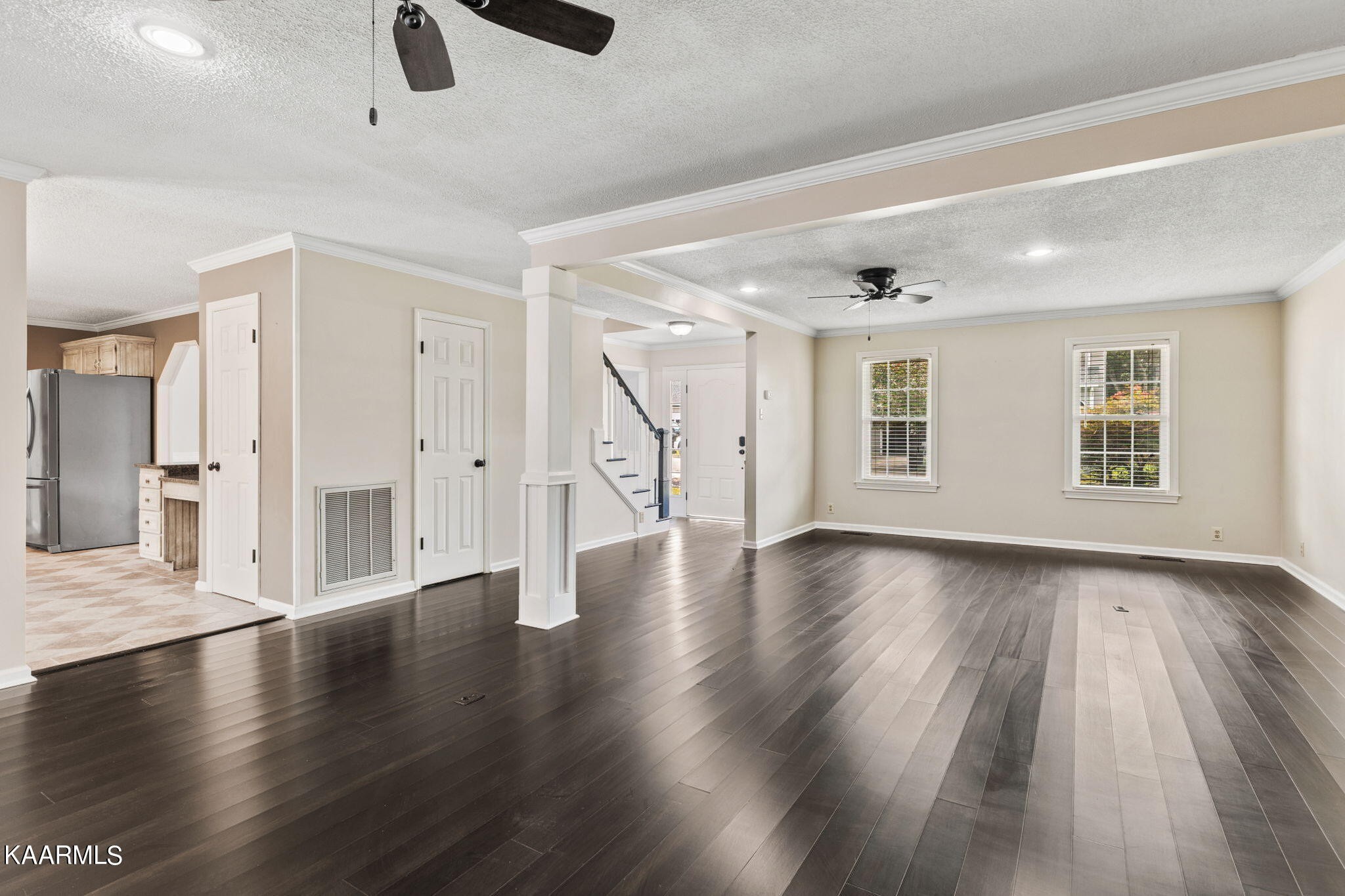 931 Pintail Road Knoxville, TN 37934 - Photo 11 of 51 a view of an empty room with wooden floor and windows