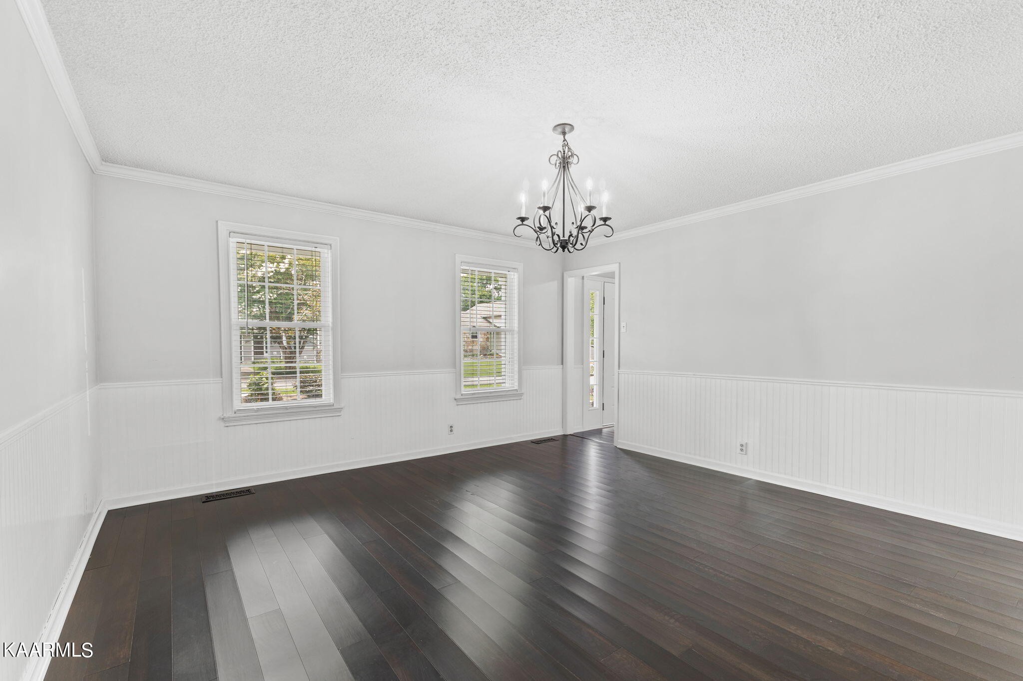 931 Pintail Road Knoxville, TN 37934 - Photo 12 of 51 a view of an empty room with wooden floor and a window