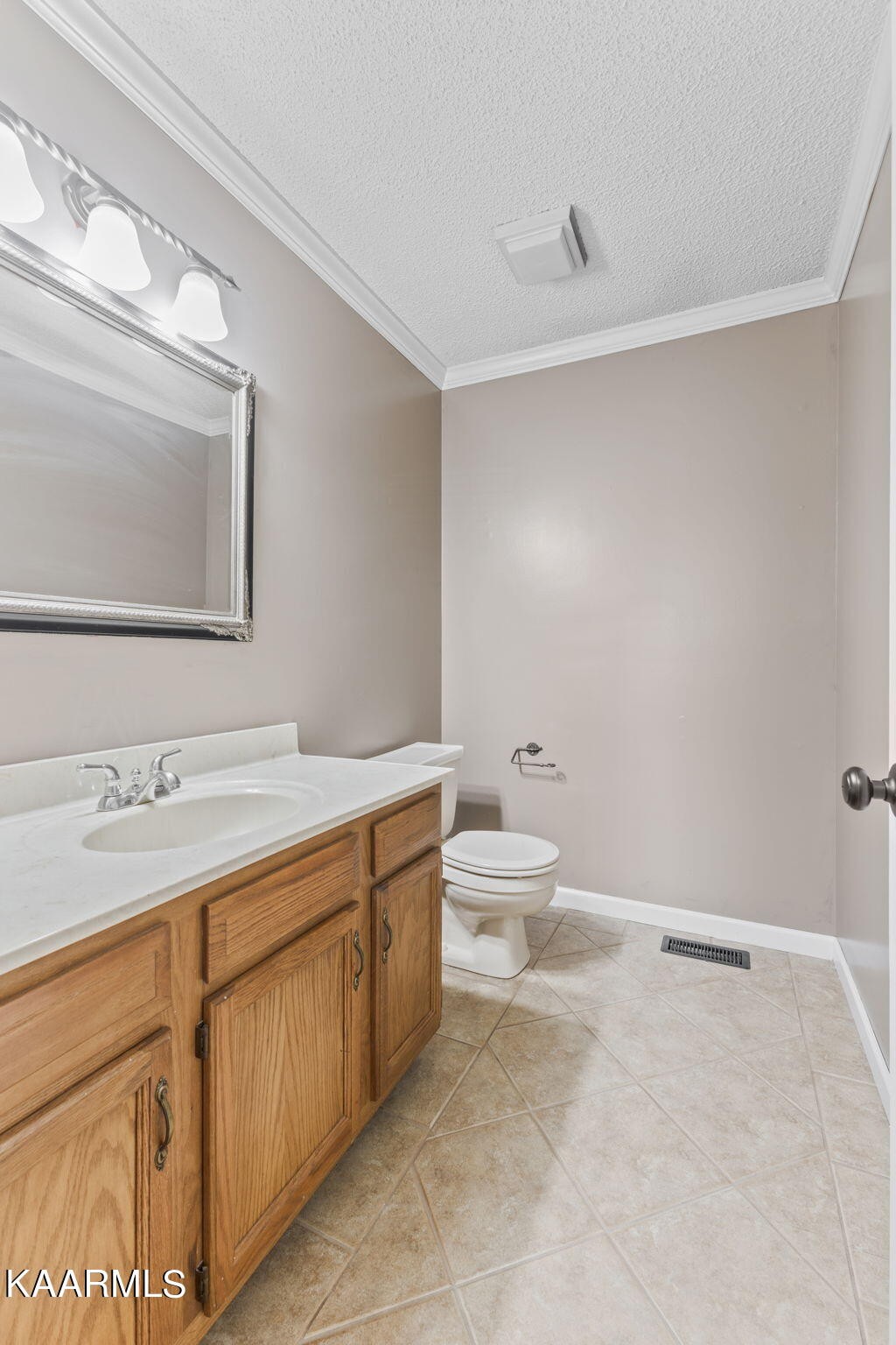 931 Pintail Road Knoxville, TN 37934 - Photo 22 of 51 a bathroom with a toilet sink and mirror