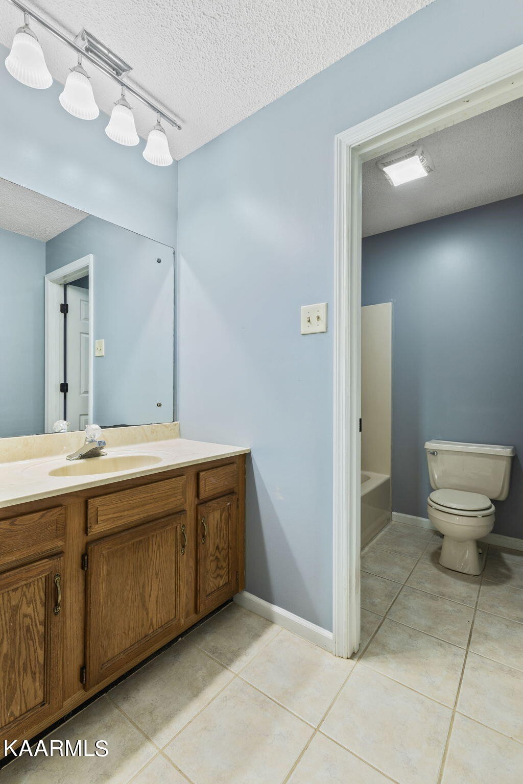 931 Pintail Road Knoxville, TN 37934 - Photo 37 of 51 a spacious bathroom with a double vanity sink and a mirror