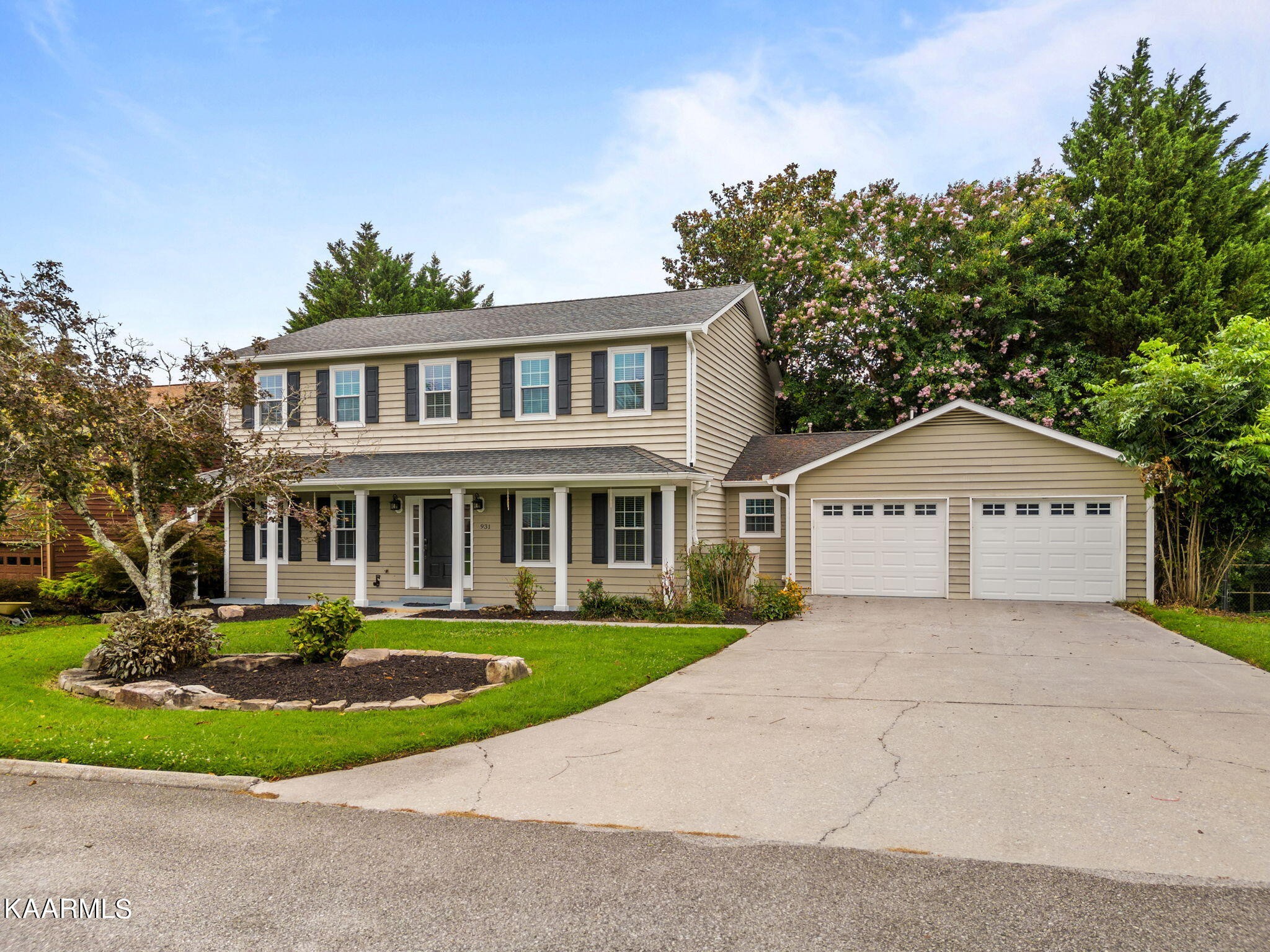 931 Pintail Road Knoxville, TN 37934 - Photo 51 of 51 a front view of a house with a yard and garage