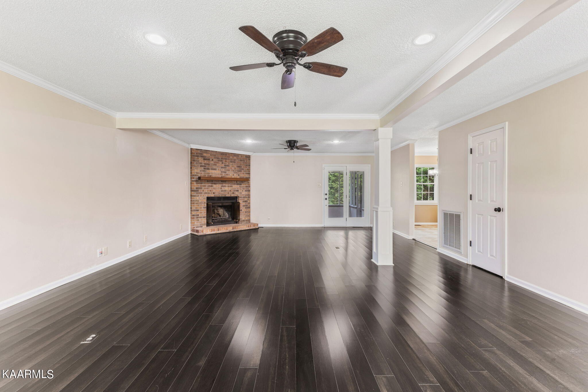 931 Pintail Road Knoxville, TN 37934 - Photo 10 of 51 a view of an empty room with window and wooden floor