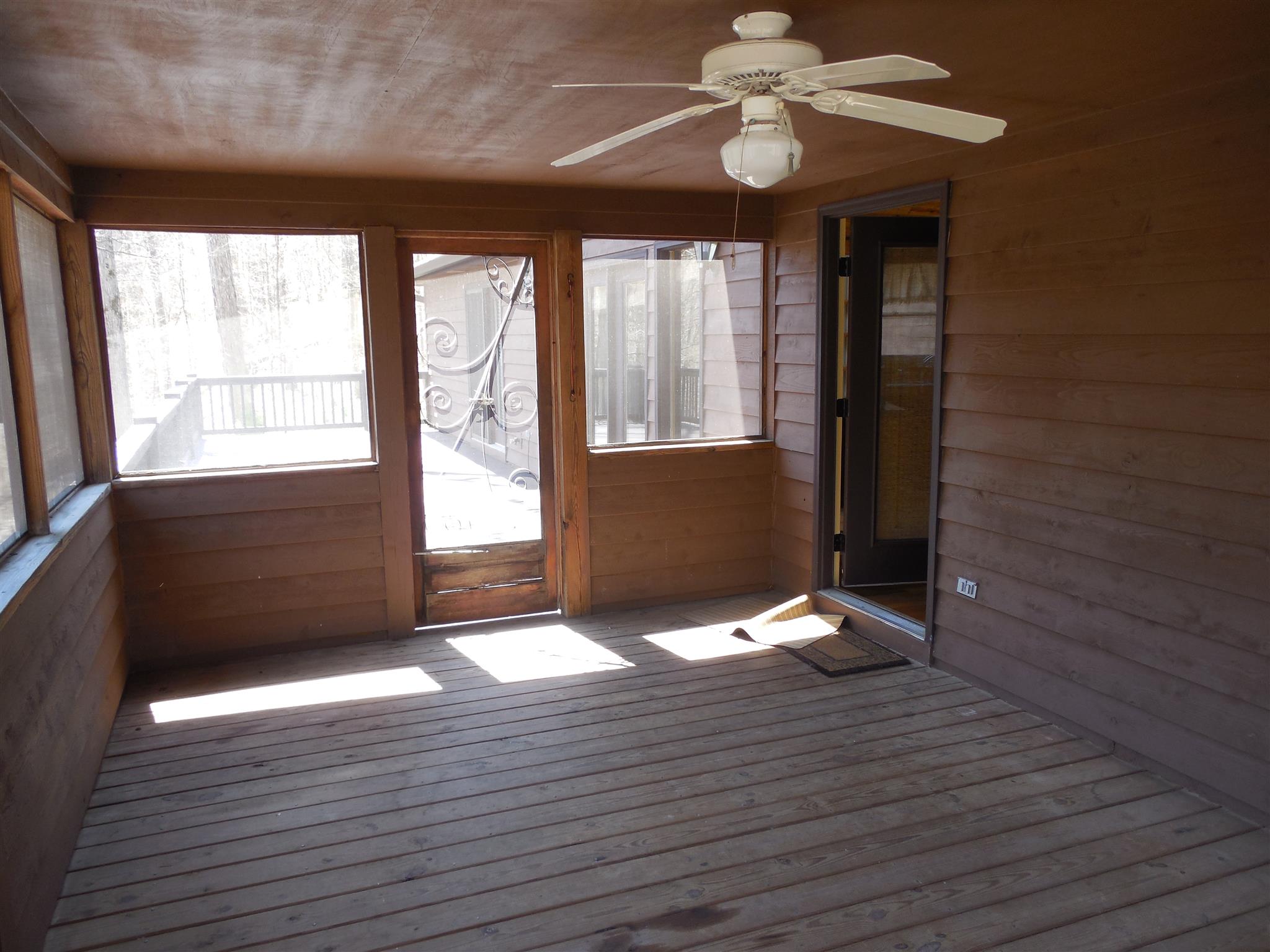 1235 Campbell Ridge Road Kingston Springs, TN 37082 - Photo 11 of 12 a view of an empty room with wooden floor and a window