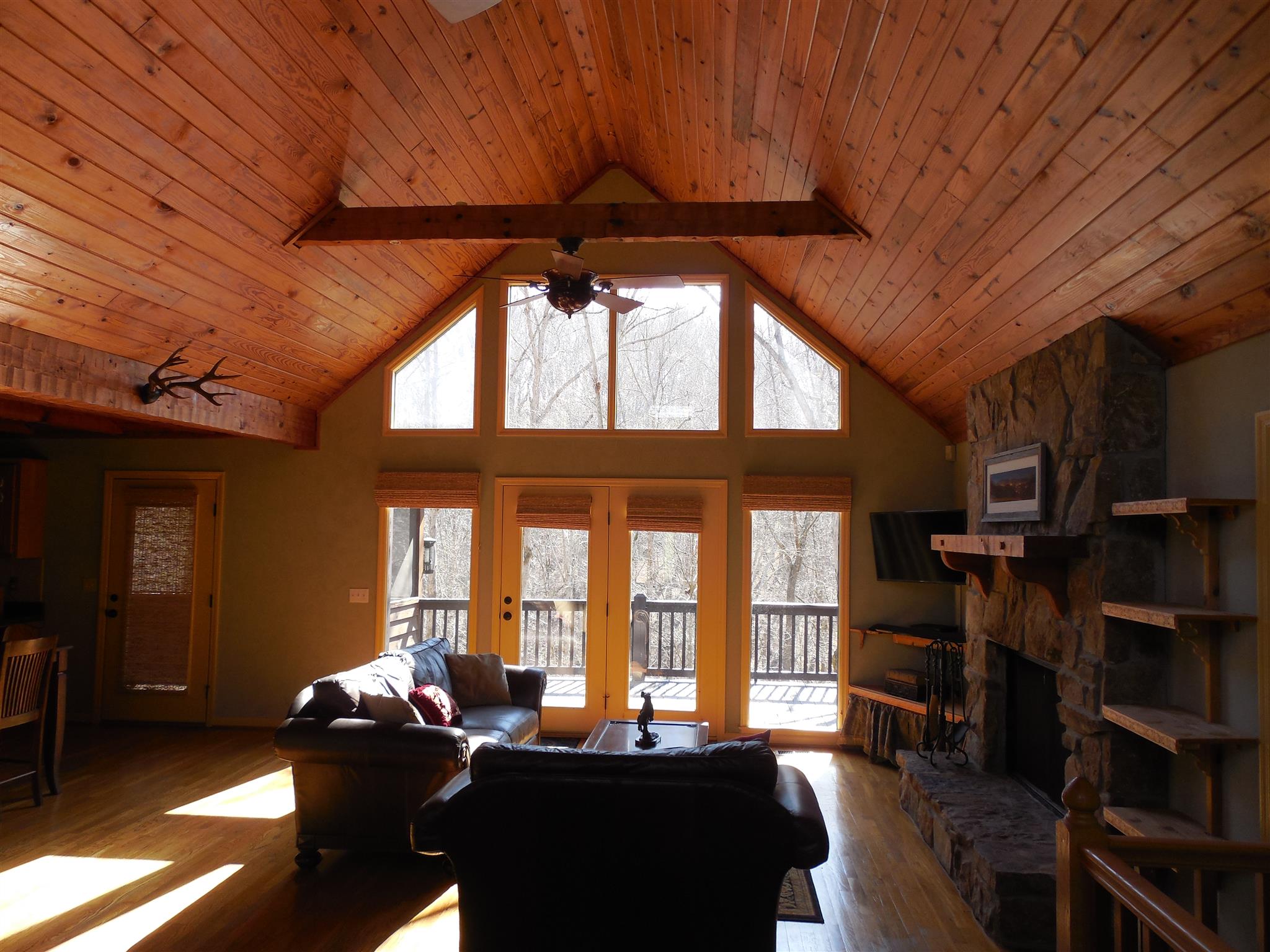 1235 Campbell Ridge Road Kingston Springs, TN 37082 - Photo 3 of 12 a living room with furniture a ceiling fan and a window