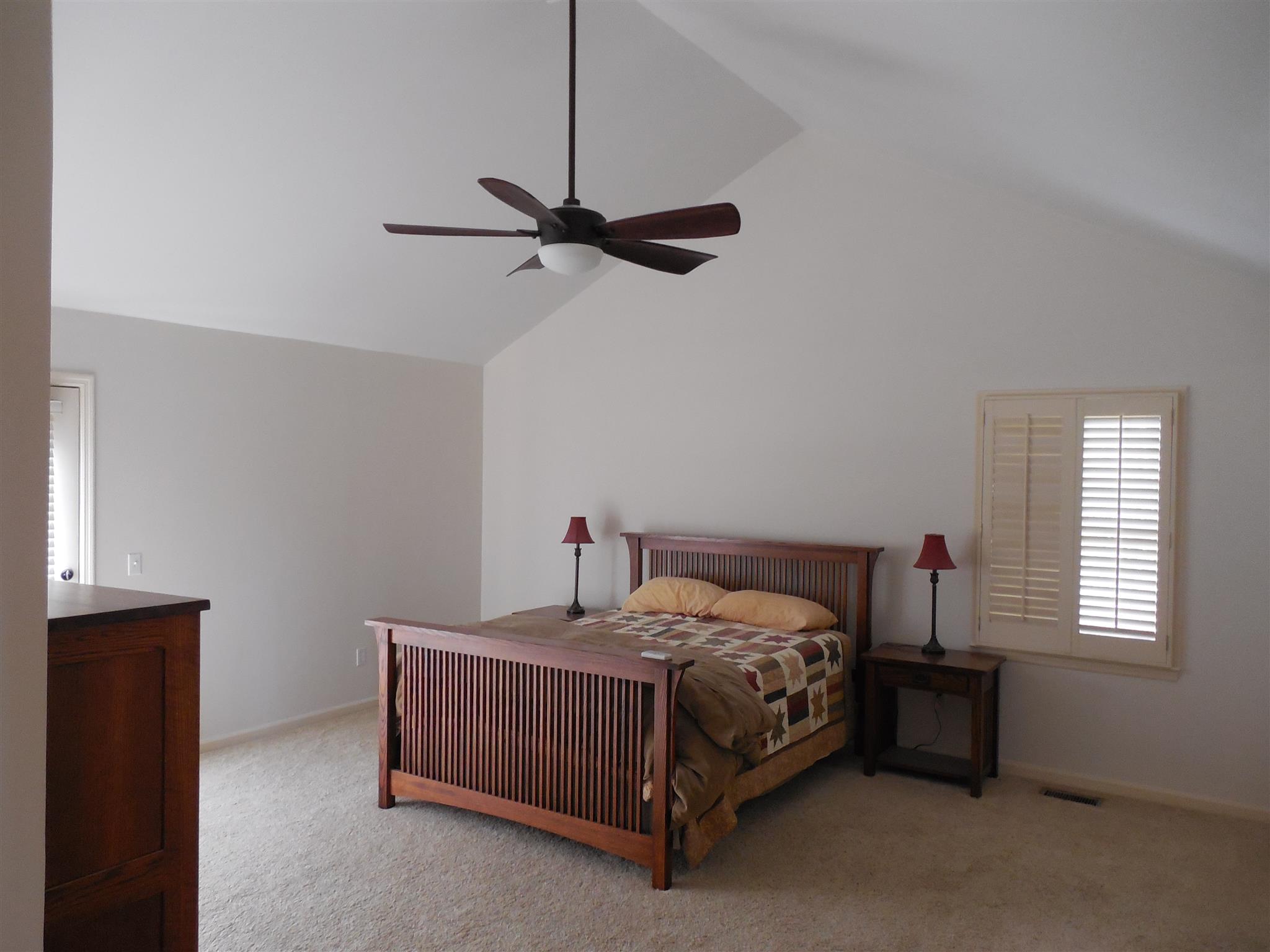 1235 Campbell Ridge Road Kingston Springs, TN 37082 - Photo 5 of 12 a bedroom with a bed and a window