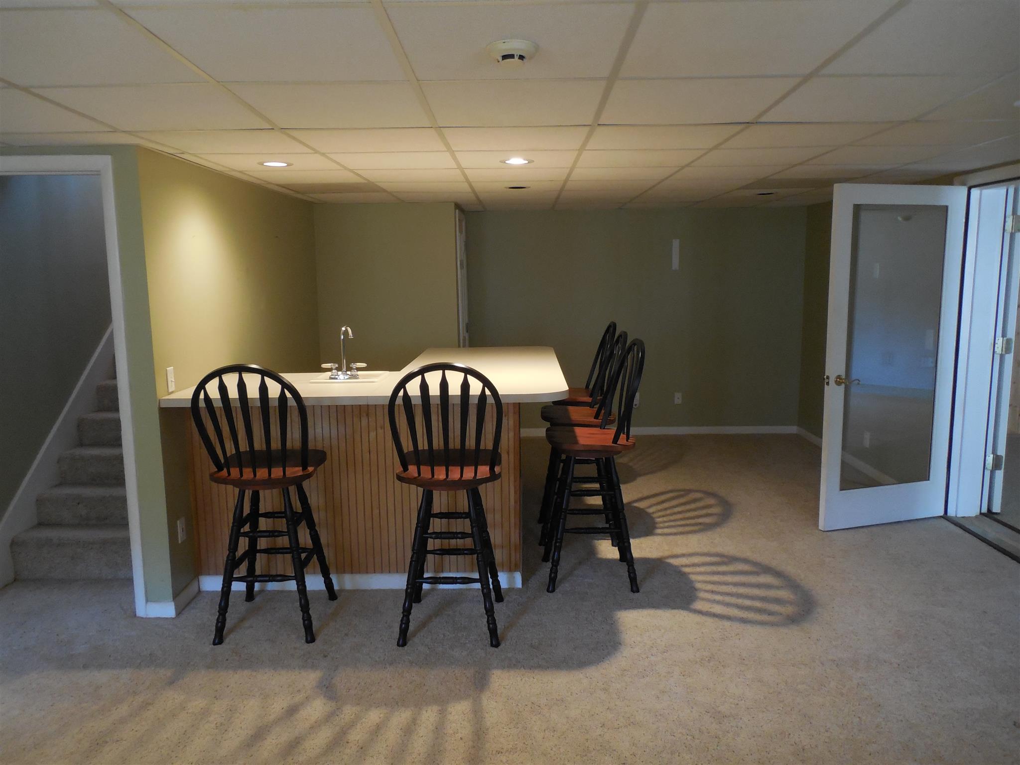 1235 Campbell Ridge Road Kingston Springs, TN 37082 - Photo 6 of 12 a view of a dining room with furniture and wooden floor