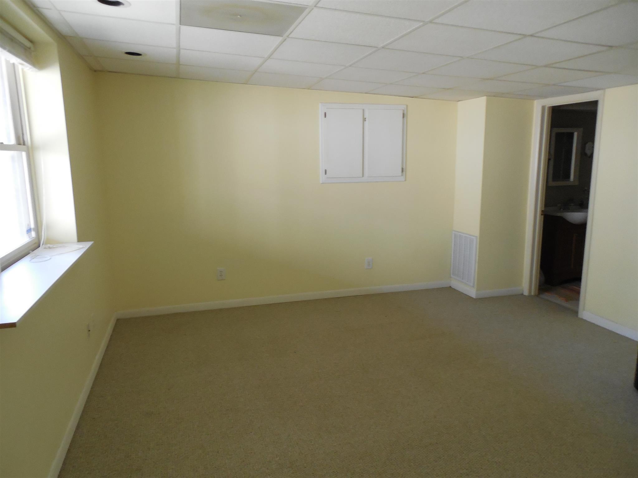 1235 Campbell Ridge Road Kingston Springs, TN 37082 - Photo 10 of 12 an empty room with a windows