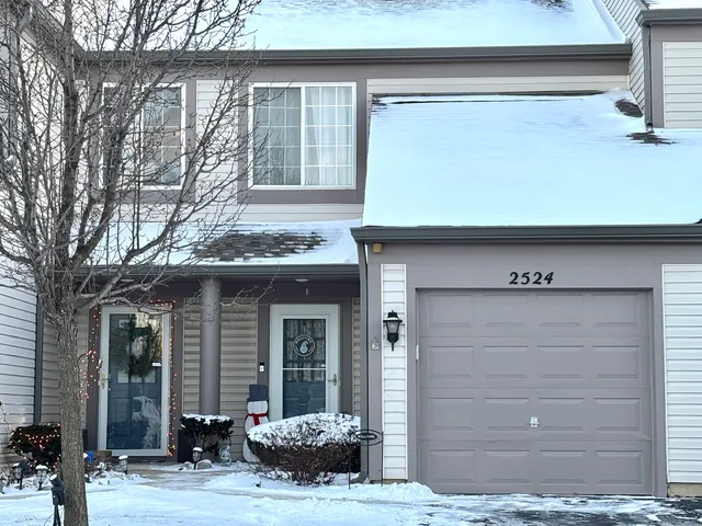 a front view of a house with a outdoor space