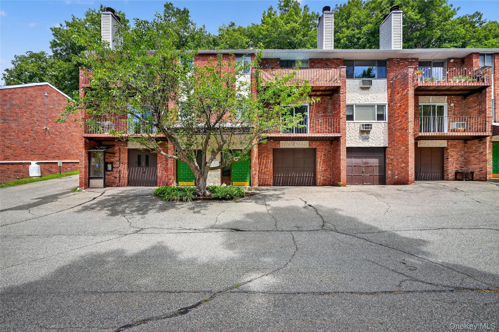 1203 Parkview Drive, Unit 1203 Southfields, NY 10975 - Photo 1 of 1 View of property with a garage and driveway