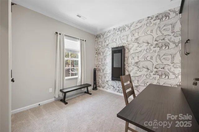 a view of livingroom with hardwood floor and a window