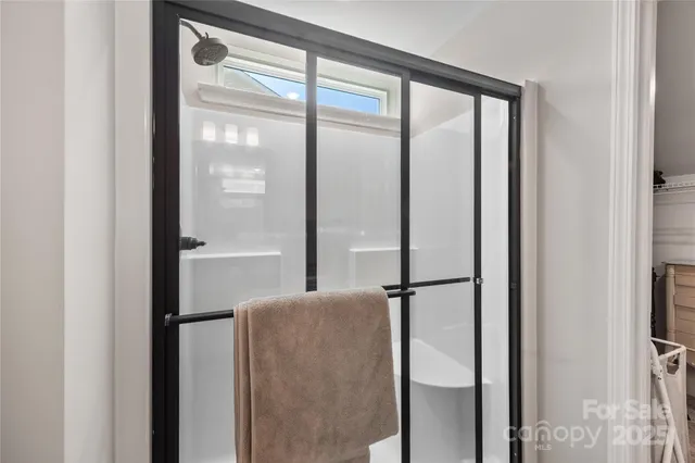 a walk in closet with window